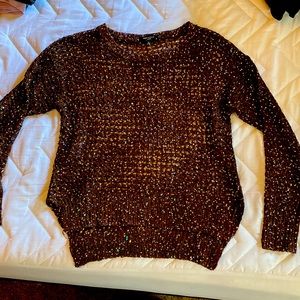 Dark brown sequined top.